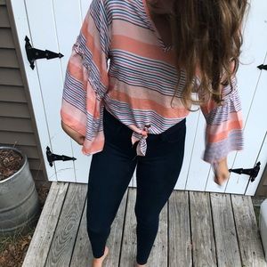 Orange and blue striped blouse
